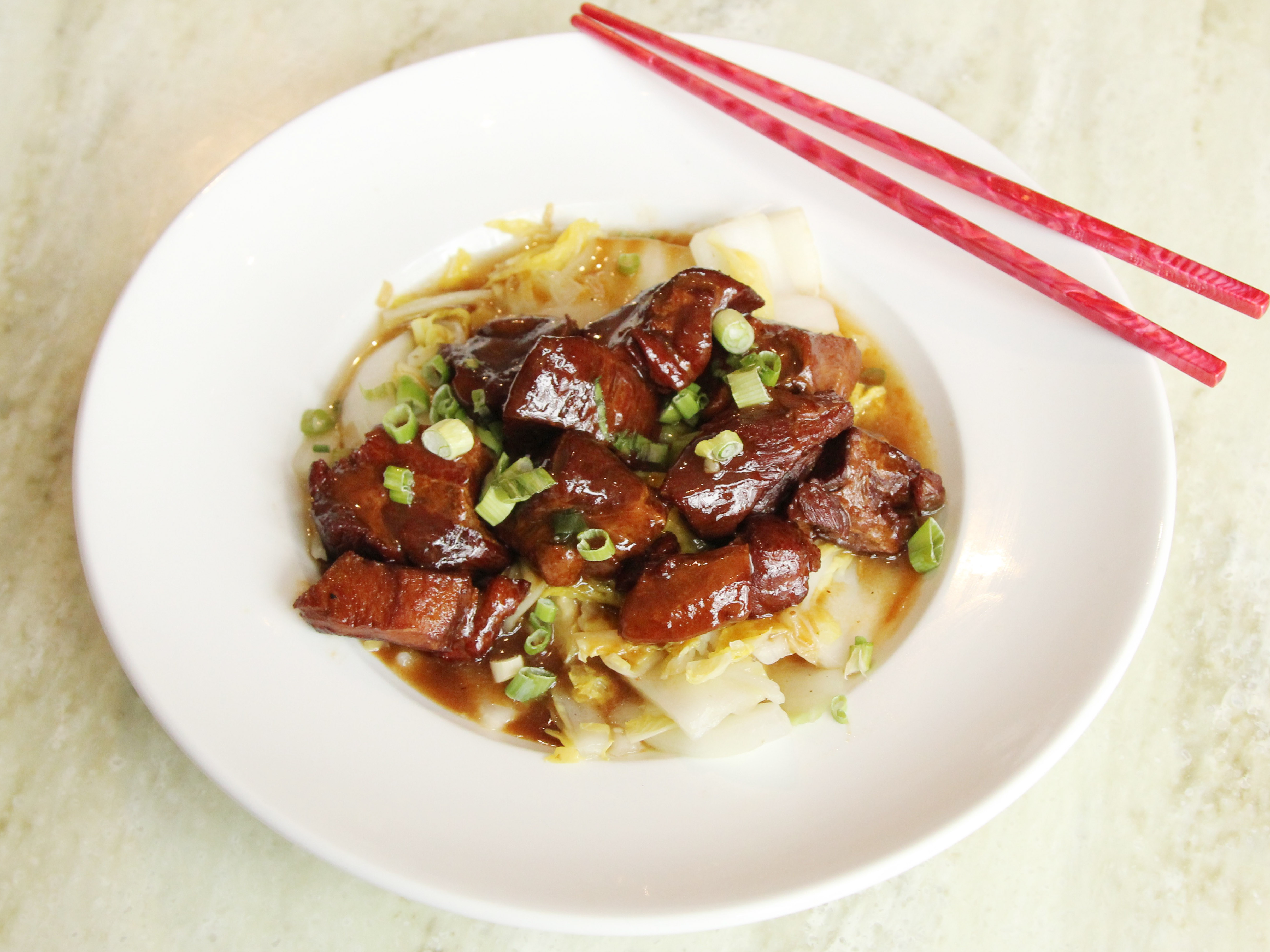 Order Red Stewed Pork Belly with Napa Cabbage food online from The Pearl Asian Kitchen store, Shaker Heights on bringmethat.com