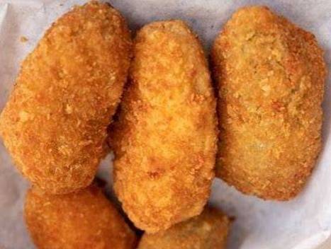 Order Fried Jalapeño Poppers (7 pc.) food online from Nizario's Pizza store, San Francisco on bringmethat.com