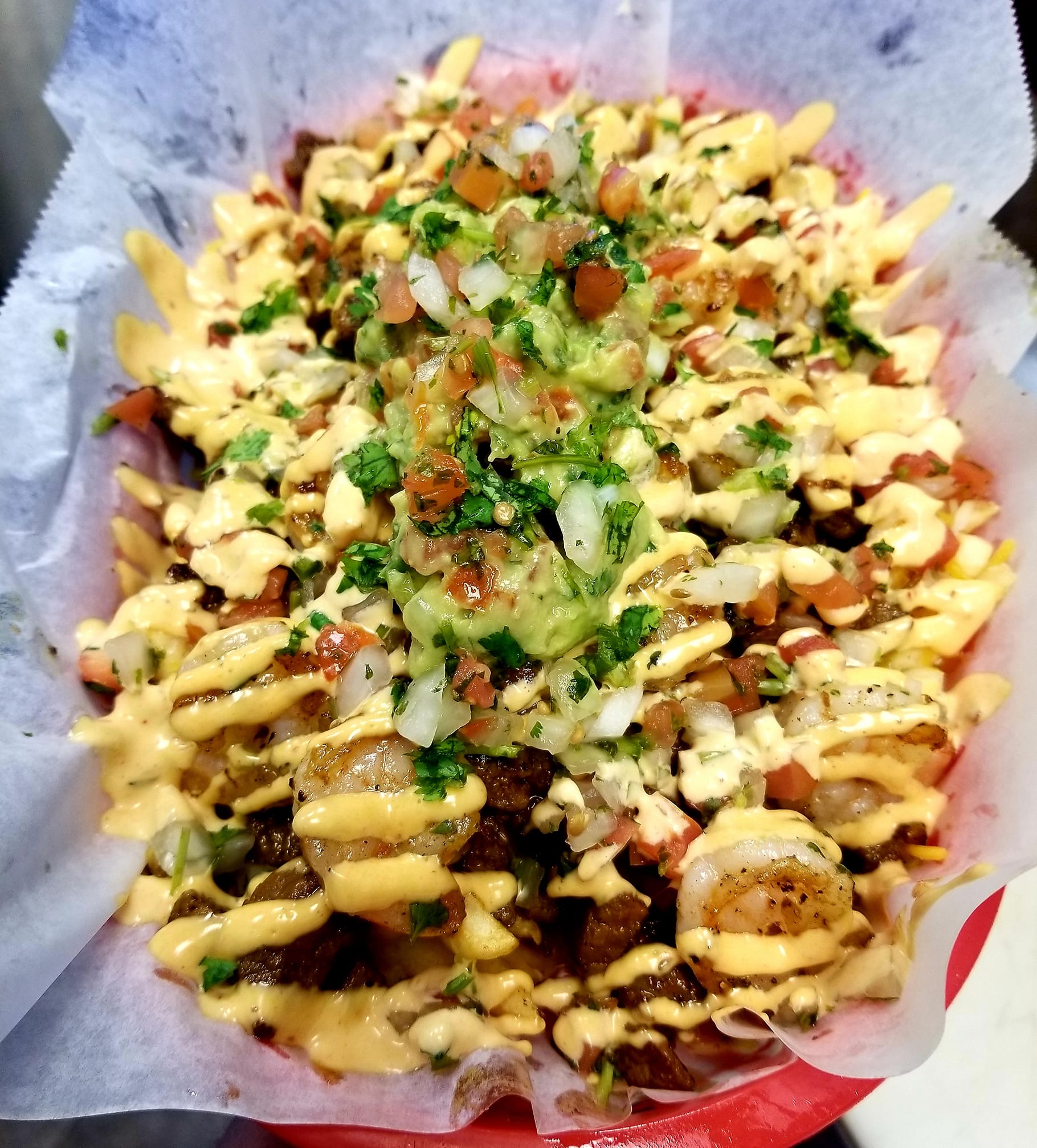 Order Surf N' Turf Fries food online from Fuego Mexican Kitchen store, Las Vegas on bringmethat.com