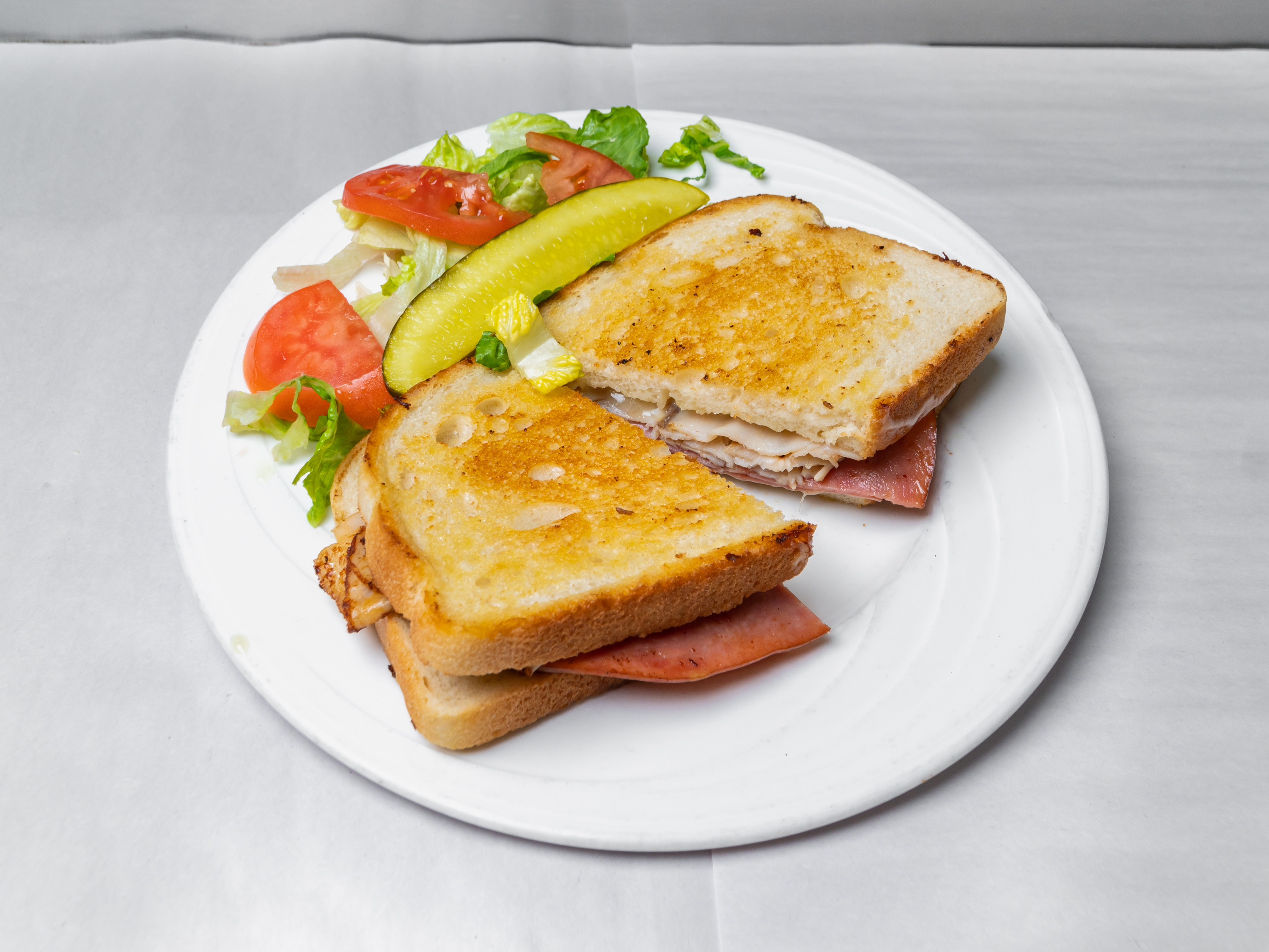 Order Turkey Club Sandwich food online from The Spot store, Baltimore on bringmethat.com