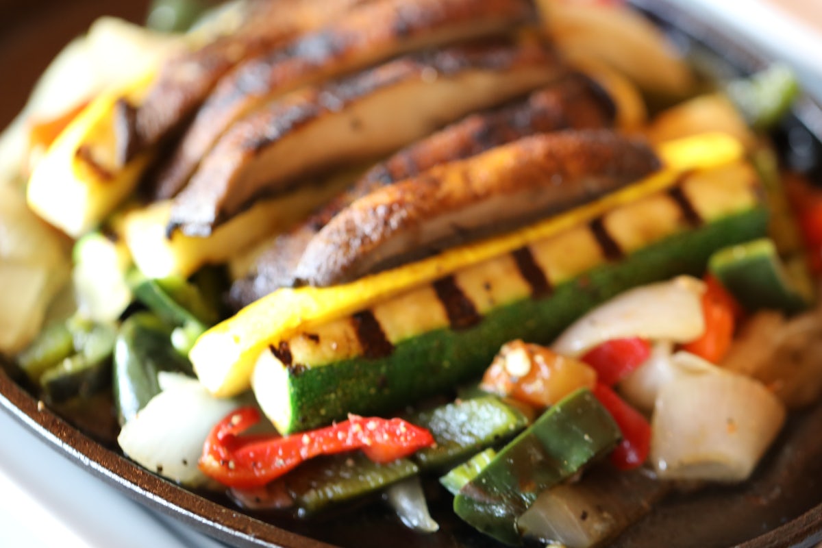 Order Grilled Vegetable Fajitas for One food online from Uncle Julio's store, Chicago on bringmethat.com