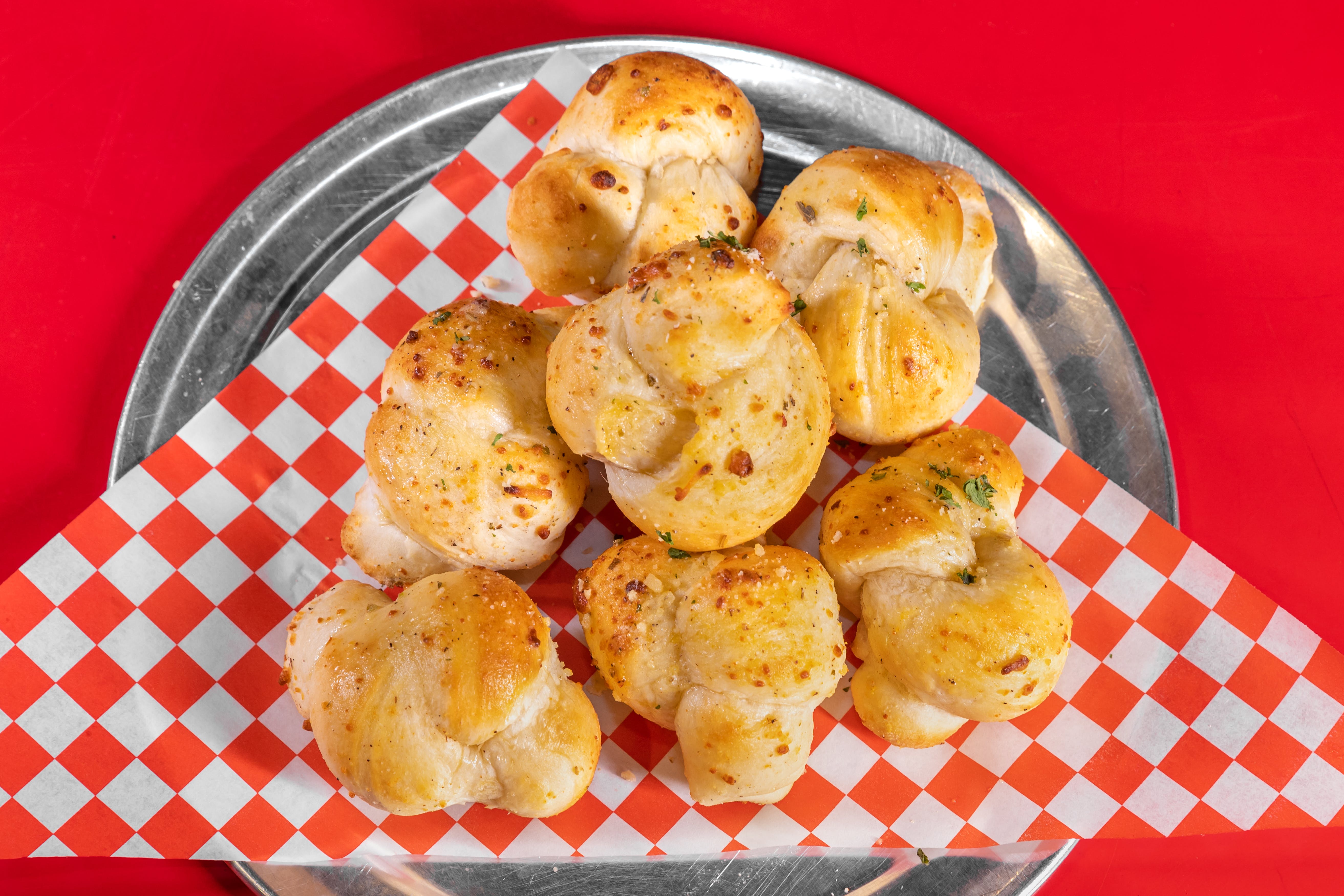 Order Garlic Knots - Regular food online from Larry Pizza store, Fullerton on bringmethat.com