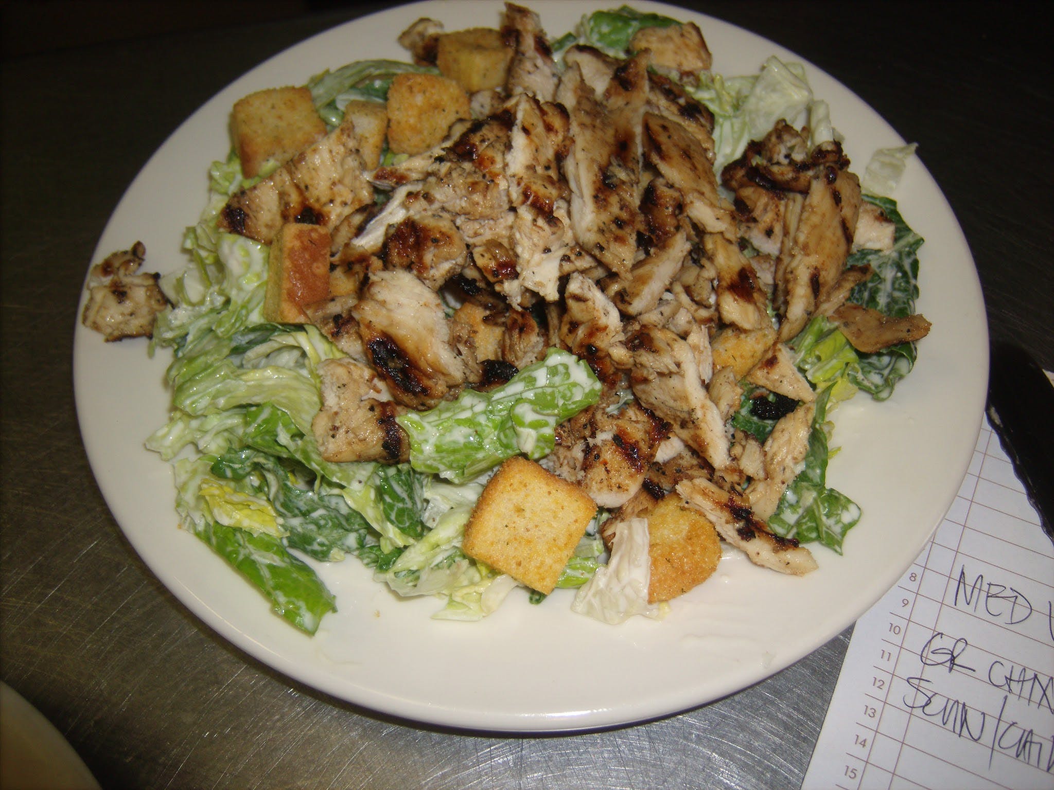 Order Caesar Salad with Grilled Chicken - Small food online from Angelina's Trattoria store, Westport on bringmethat.com