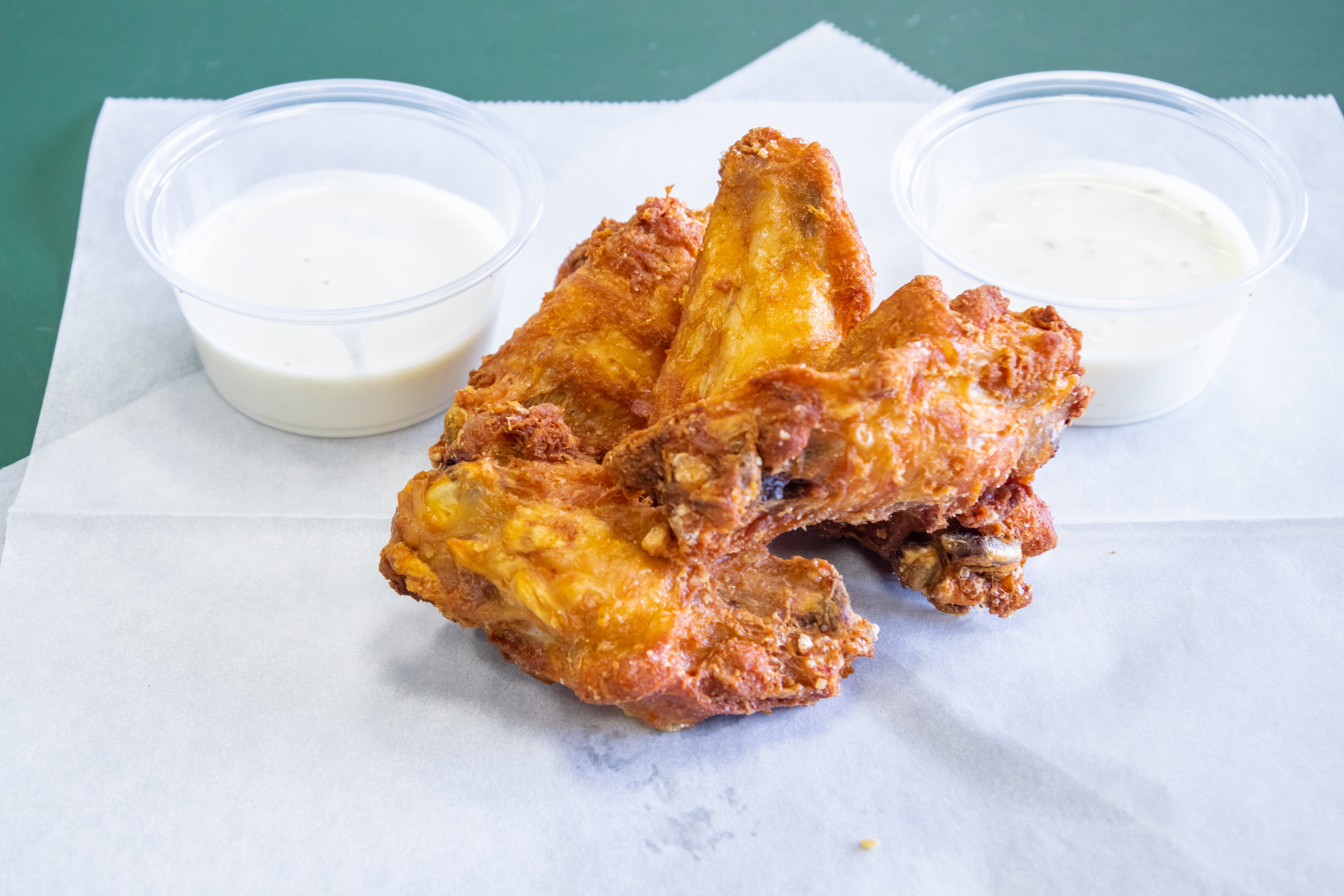 Order Bone In Wings - 1/2 Lb. food online from Casamel's Pizza store, Parma on bringmethat.com