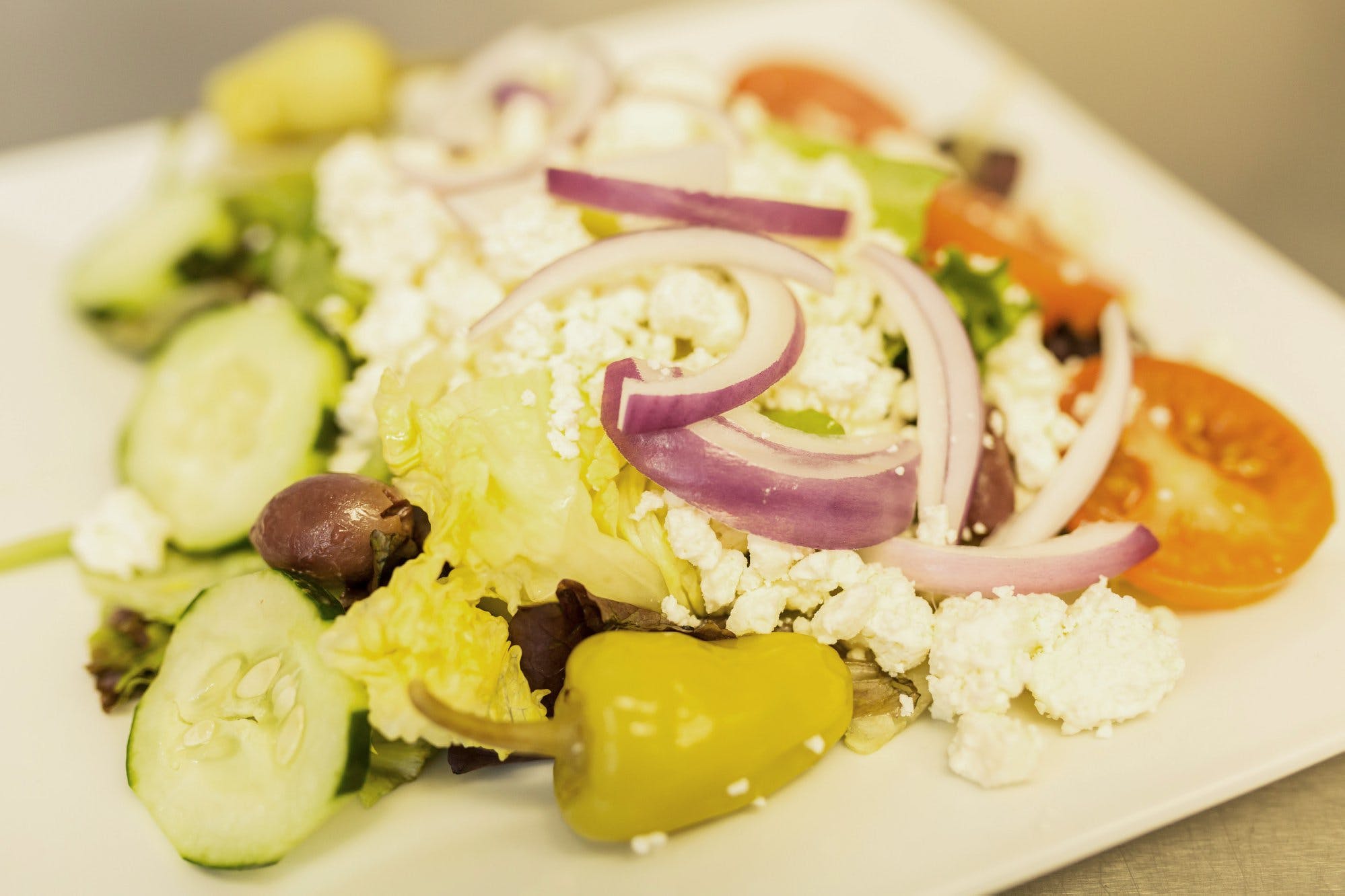 Order Greek Salad - Small food online from Carmelo's Pizza, Pasta, Subs & More!! store, Linthicum Heights on bringmethat.com