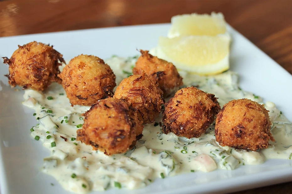 Order Crab Hushpuppies food online from West Table Kitchen & Bar store, Lubbock on bringmethat.com