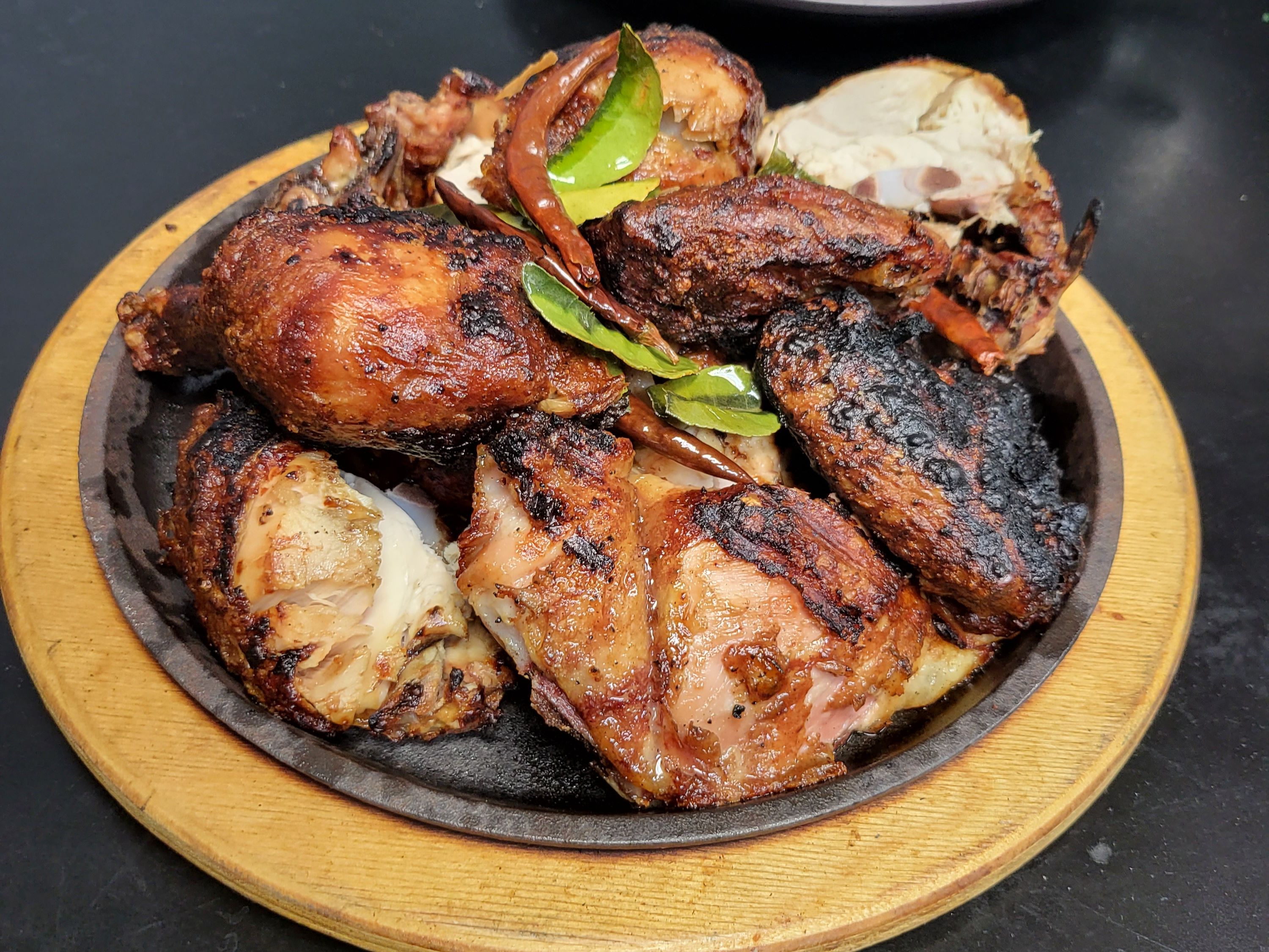 Order Grilled Half Chicken with Smoked Herbs food online from What Zaap? Thai Food store, Las Vegas on bringmethat.com