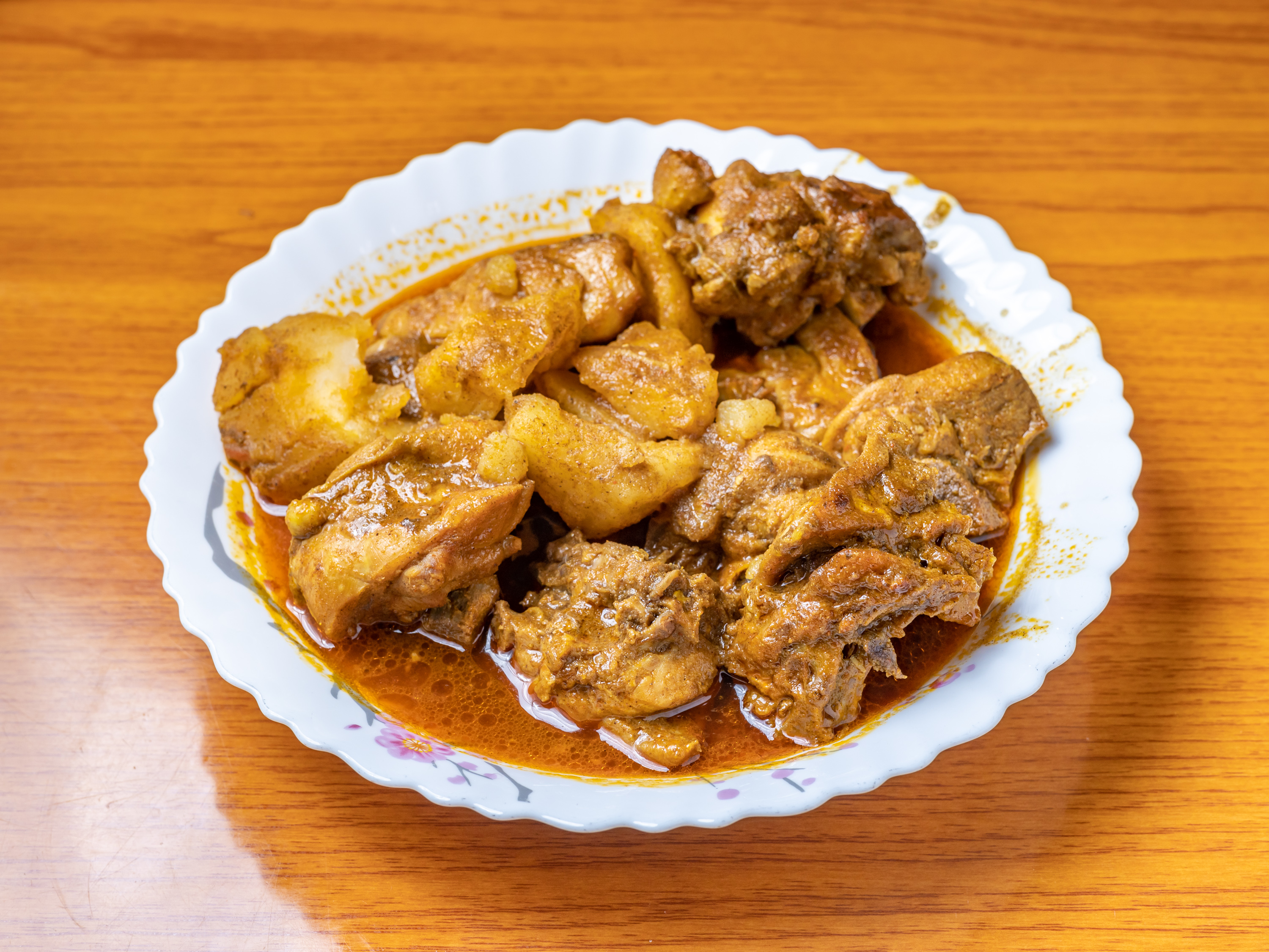 Order Chicken Curry food online from Rockaway Roti Shop store, South Ozone Park on bringmethat.com
