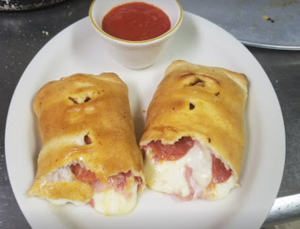 Order Meat Lovers Calzone - Single food online from New York Pizza store, Hartwell on bringmethat.com