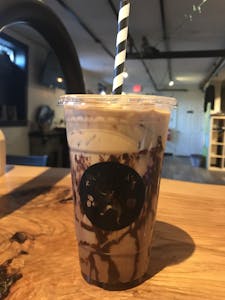 Order Almond Joy Iced Coffee  food online from Wicked Loft store, Whitman on bringmethat.com