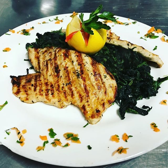 Order Marinated Grilled Chicken over Steamed Spinach food online from Nino's Pizza & Restaurant store, Hillsdale on bringmethat.com