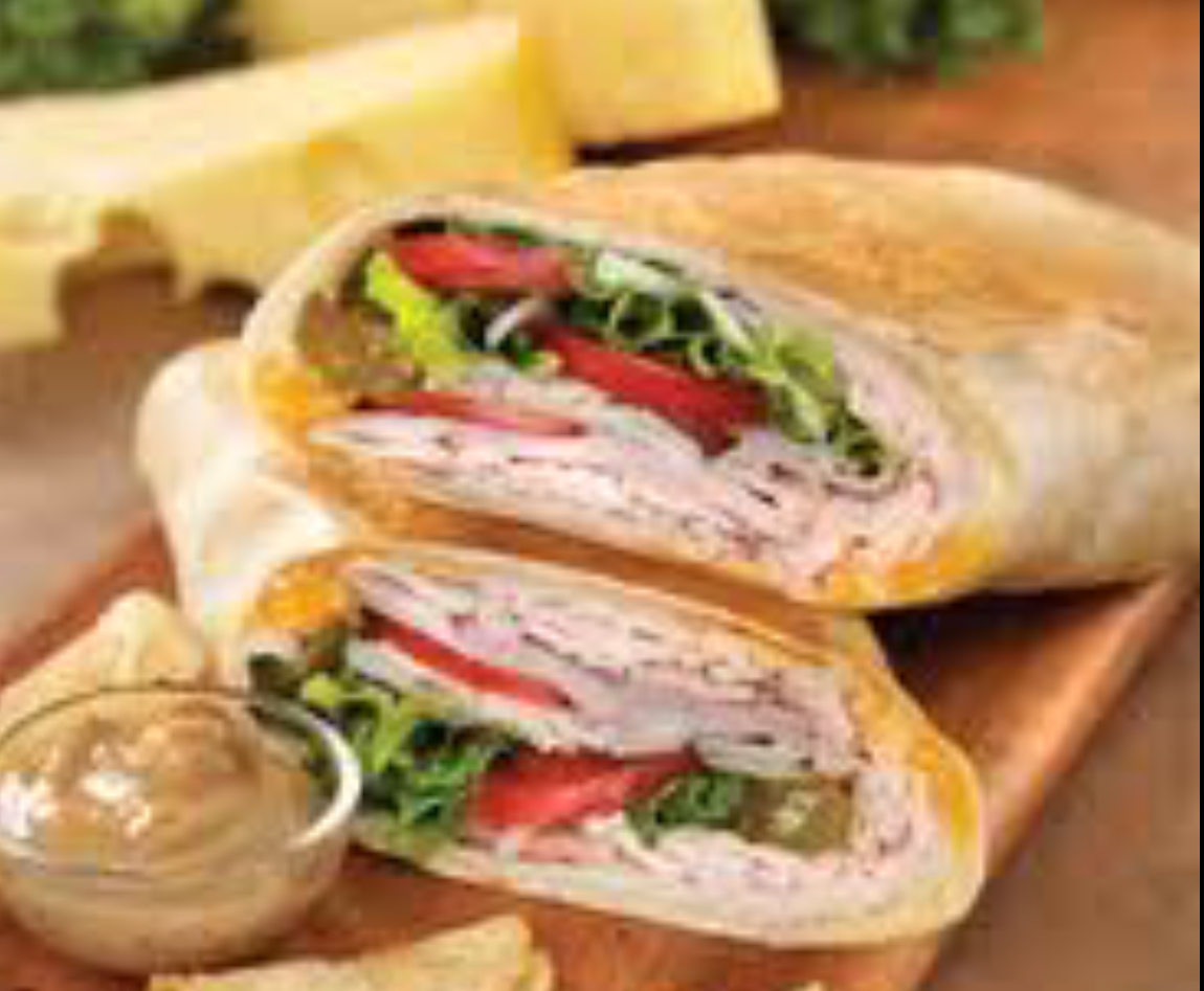Order #23 Key West Cuban Whole Sandwich food online from Roly Poly Rolled Sandwiches store, Lafayette on bringmethat.com