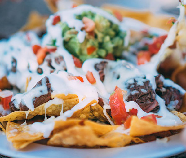 Order Carnitas Nachos food online from Don Chile Mexican Grill-Southern Blvd store, Bronx on bringmethat.com