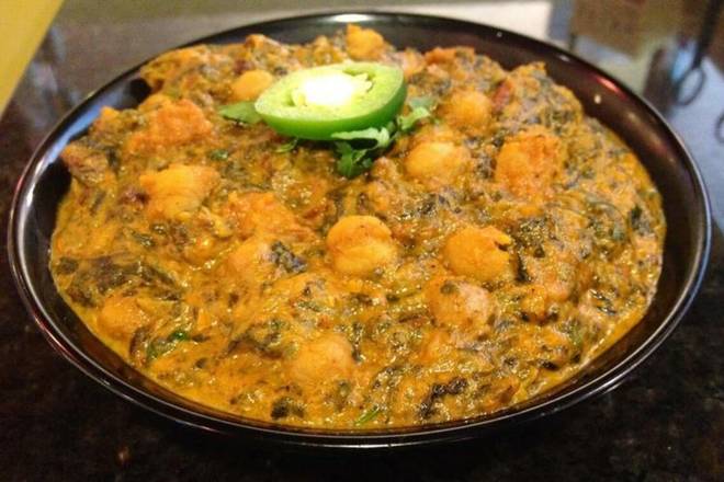 Order Saag Channa (GF) food online from Tarka Indian Kitchen store, Austin on bringmethat.com