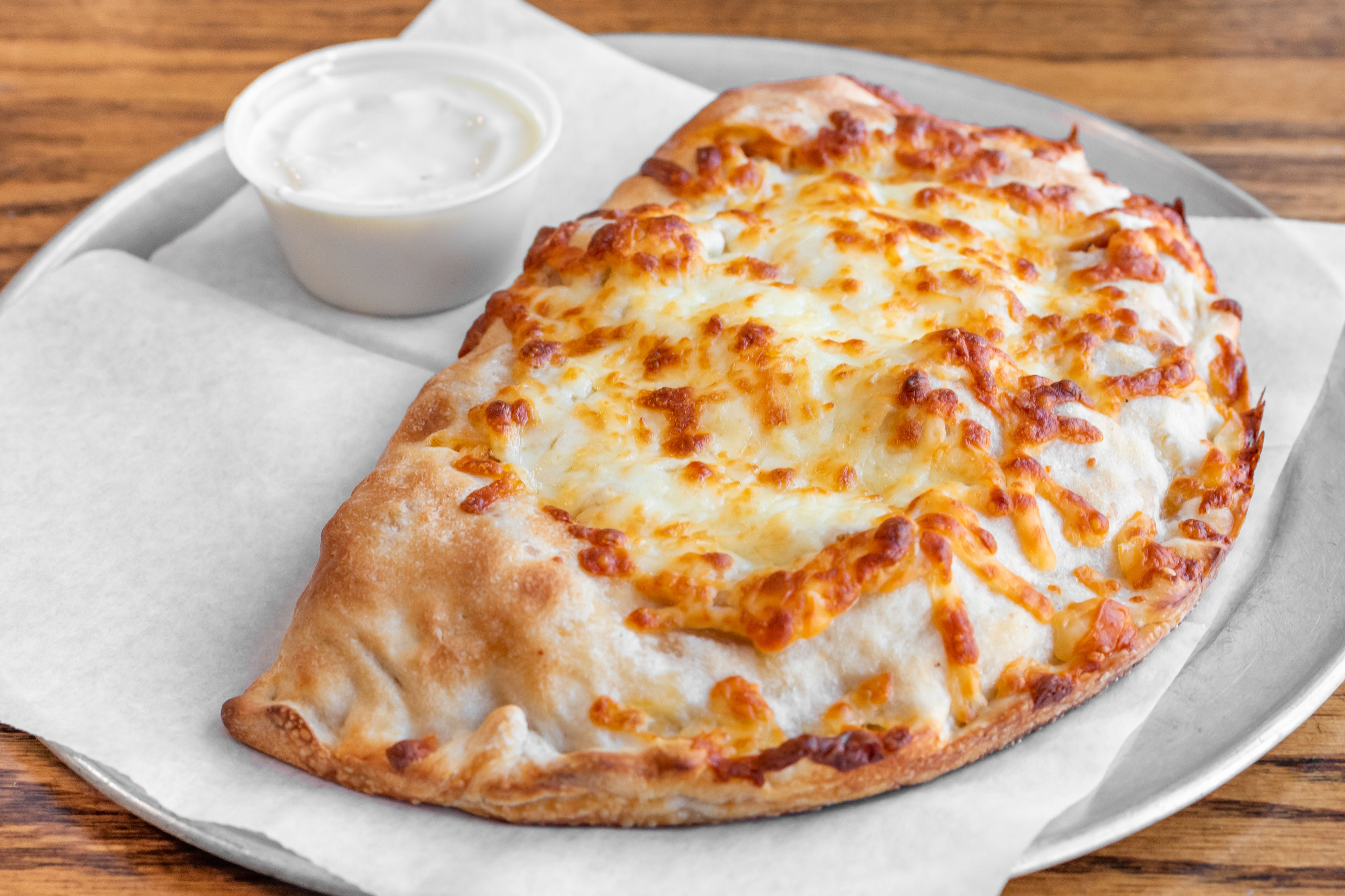 Order Cheese Calzone - Small food online from Bryantville Pizza Kitchen store, Pembroke on bringmethat.com