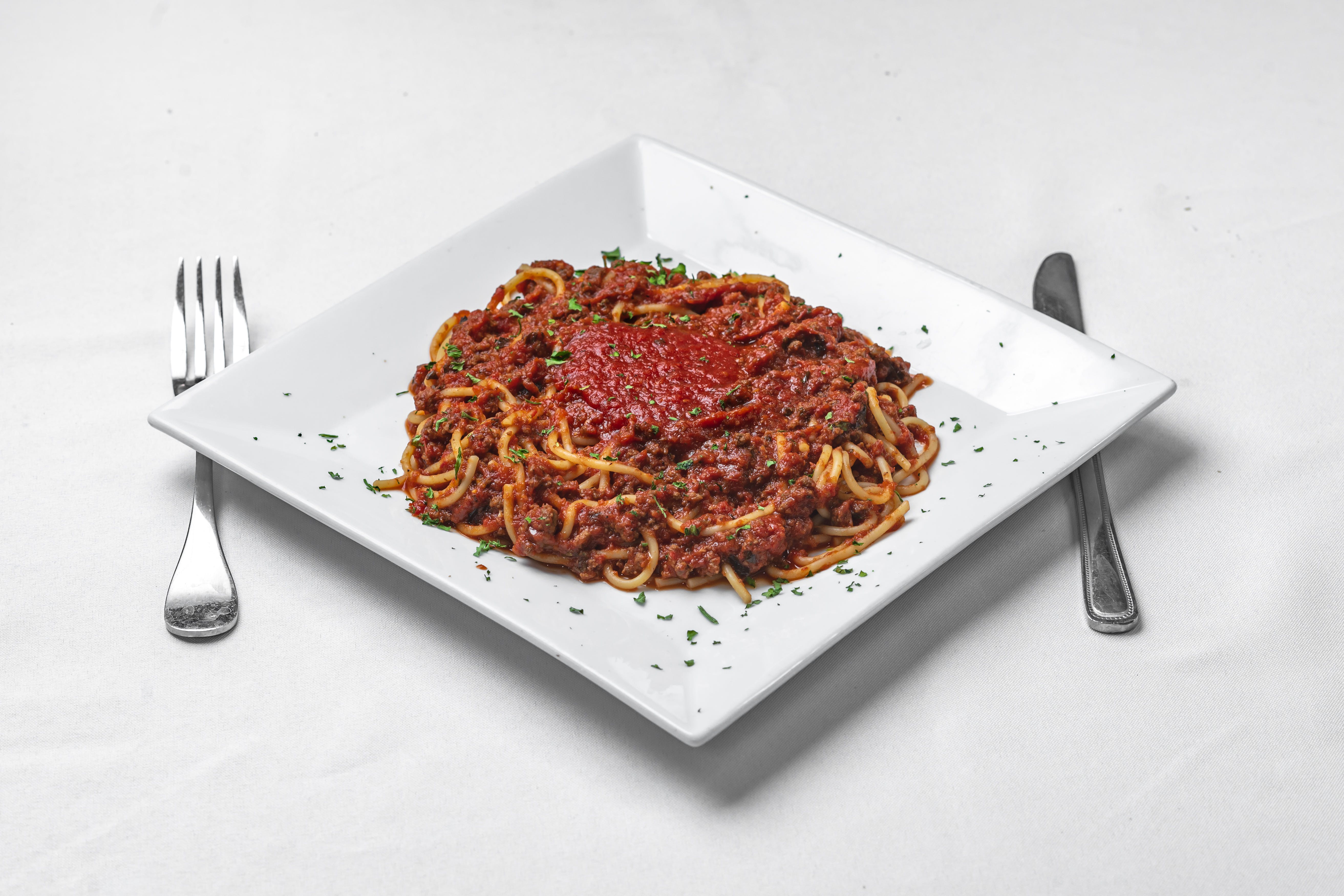 Order Pasta with Meat Sauce - Pasta food online from Leo Pizza Italian Restaurant store, Washington on bringmethat.com