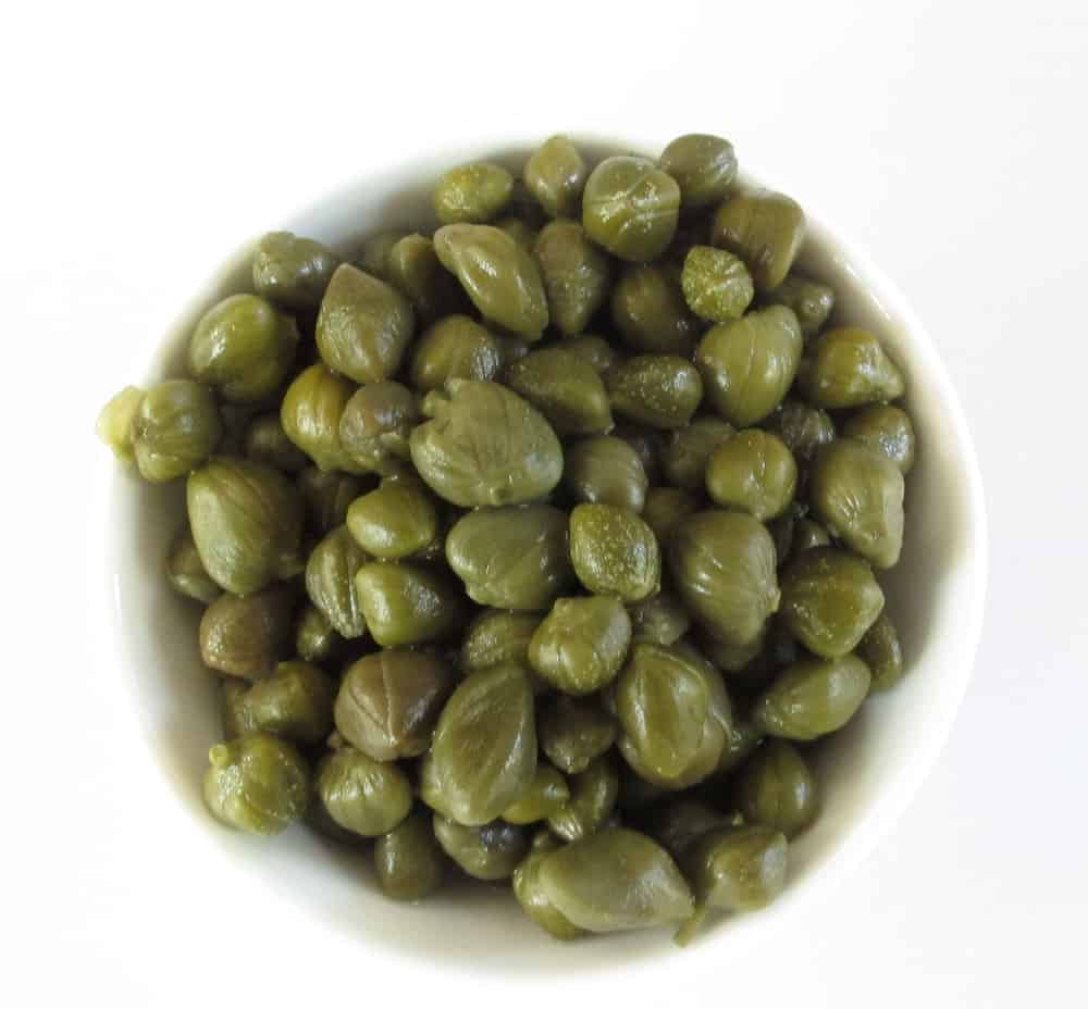 Order 1/4 Pound Container of Capers food online from Murray's Bagels store, New York on bringmethat.com