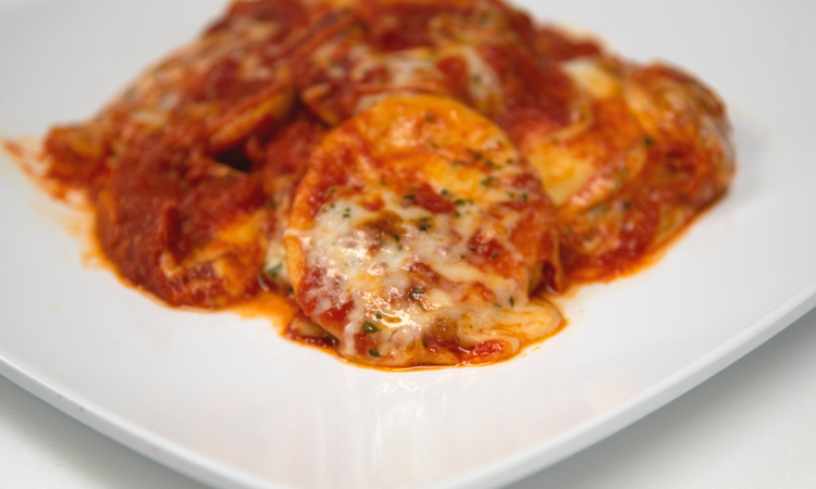 Order Baked Ravioli w/ Mozzarella food online from Mike's Pizzeria store, Los Angeles on bringmethat.com