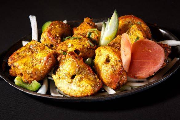 Order Chicken Tikka food online from Bombay Bistro store, Austin on bringmethat.com