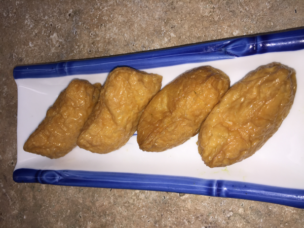 Order 4 Piece Inari food online from Jazz Sushi Bar store, New Orleans on bringmethat.com
