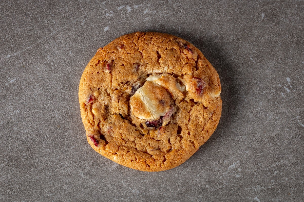 Order Cranberry White Chocolate food online from Urbane Cafe store, San Luis Obispo on bringmethat.com