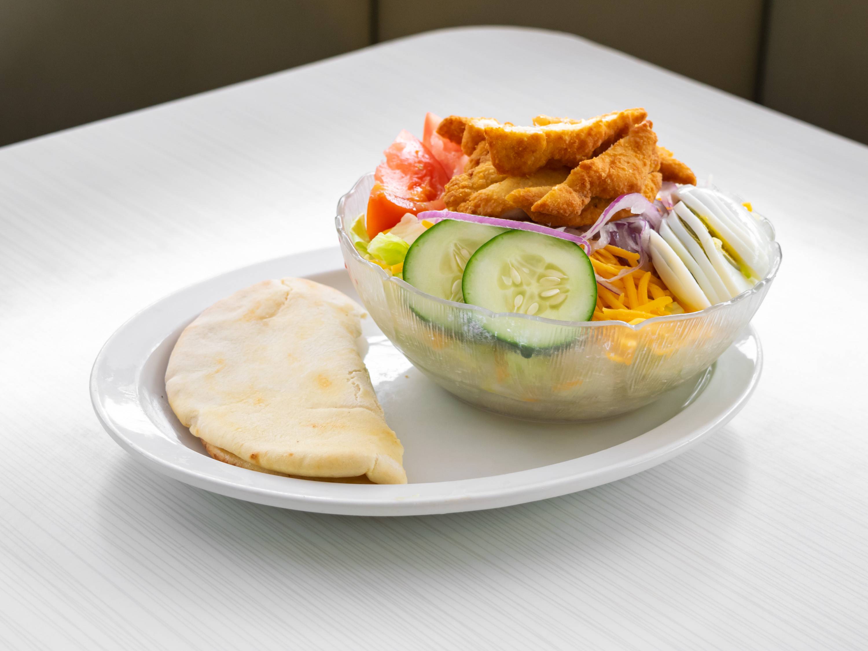 Order Chicken Fingers Salad food online from Leo Coney Island On Tap (122 Oakes St Sw store, Grand Rapids on bringmethat.com