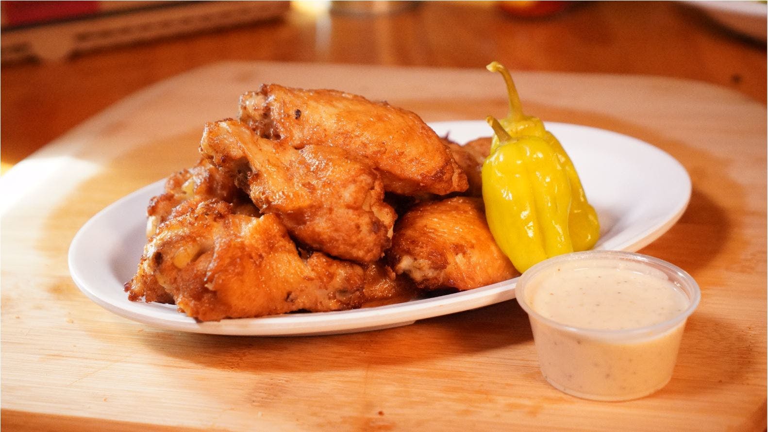 Order Bone In Wings - 6 Pieces food online from Greek's Pizzeria & Tapp Room store, Franklin on bringmethat.com