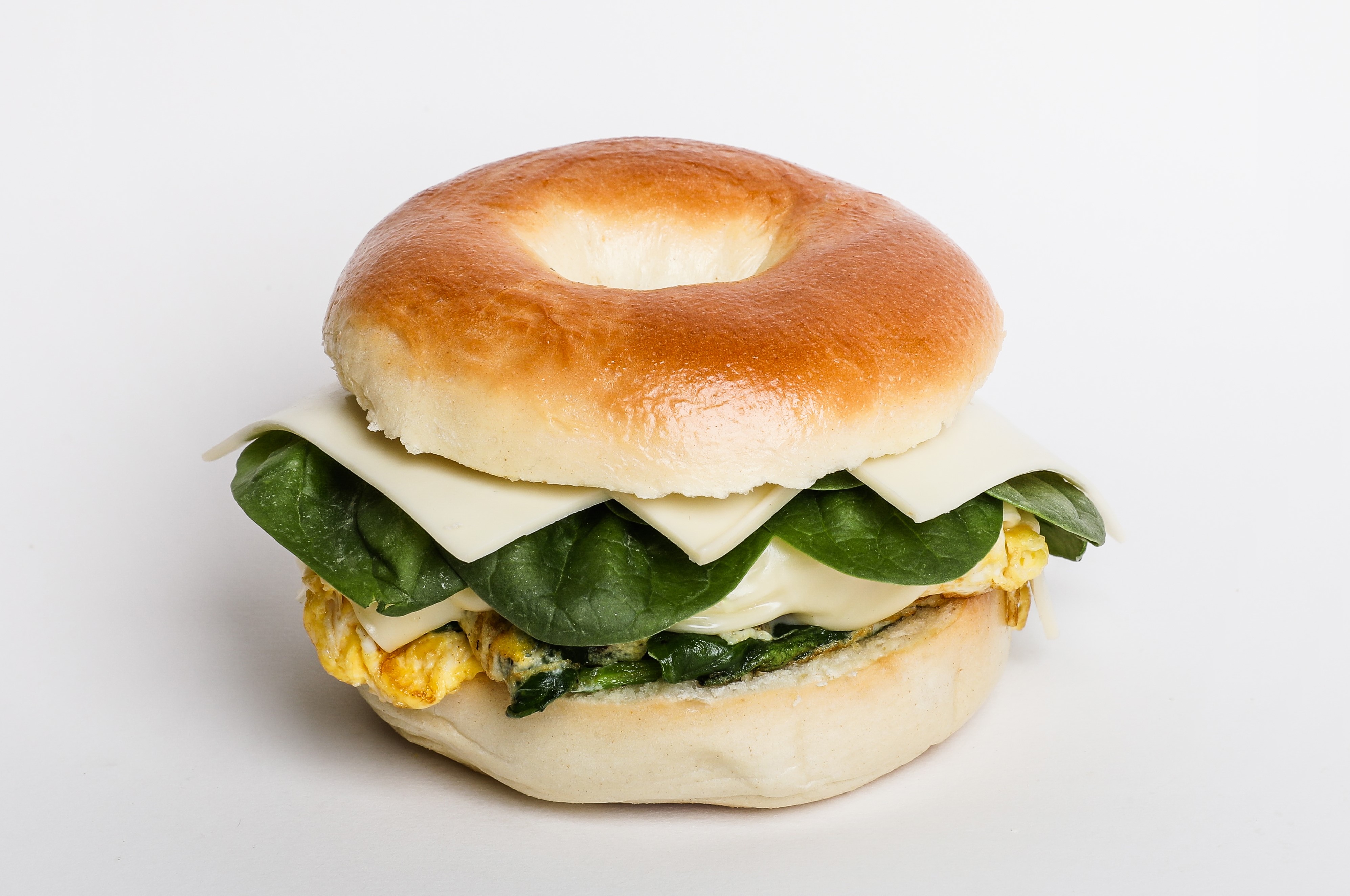 Order 2. Turkey, Cream Cheese and Avocado Bagel food online from Dc Cafe Donuts store, Reseda on bringmethat.com