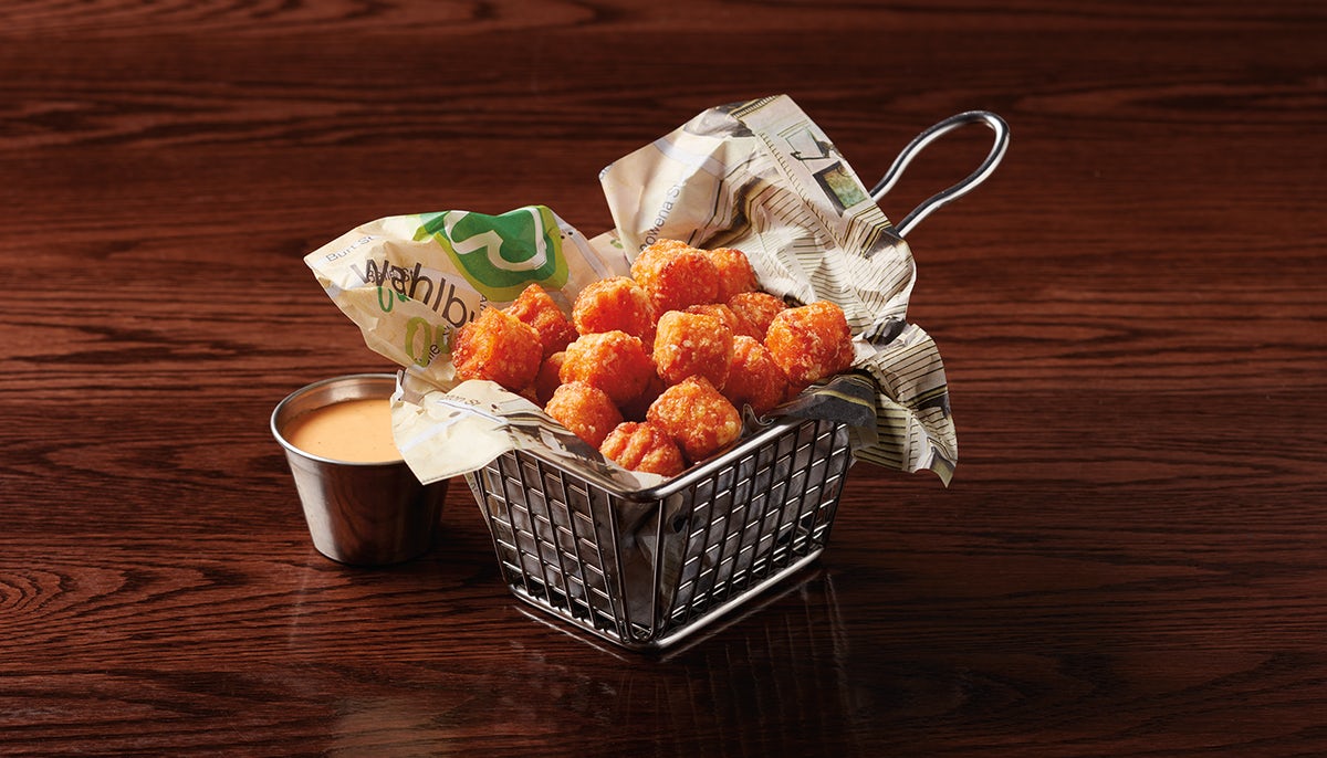 Order Side Sweet Potato Tots food online from Wahlburgers store, Olathe on bringmethat.com