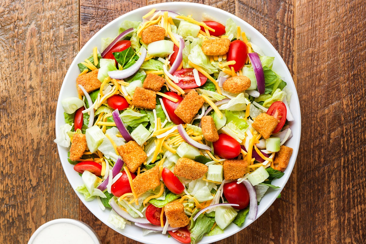 Order House Salad food online from Outback Steakhouse store, Atlanta on bringmethat.com