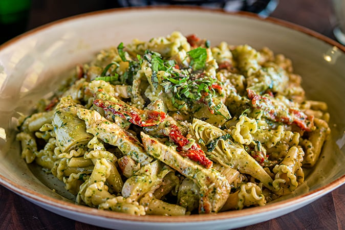 Order Pistachio Pesto Chicken Pasta food online from Russo Pizza store, Kingwood on bringmethat.com