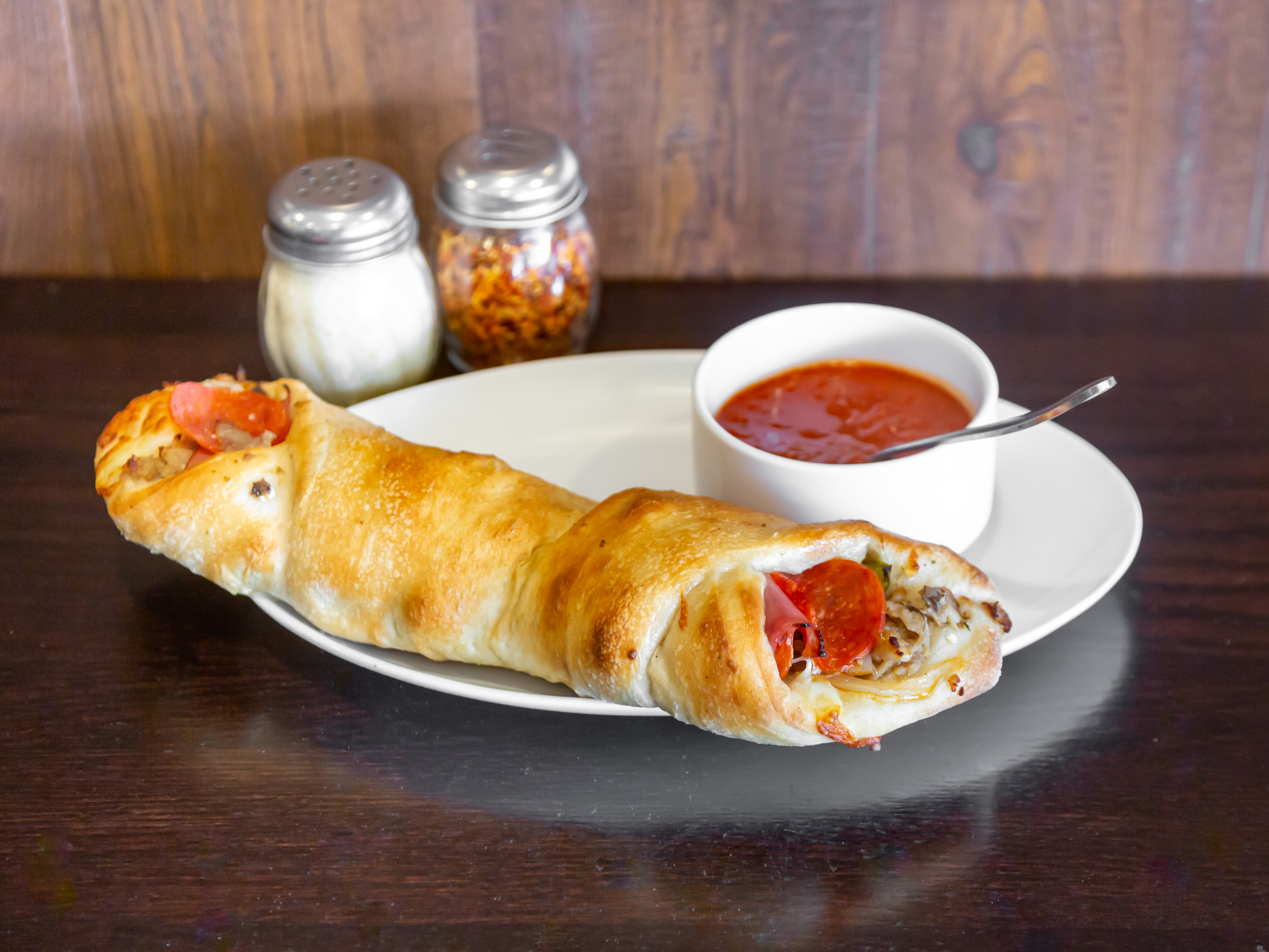 Order Stromboli Special food online from Illiano Pizzeria & Restaurant store, Colchester on bringmethat.com