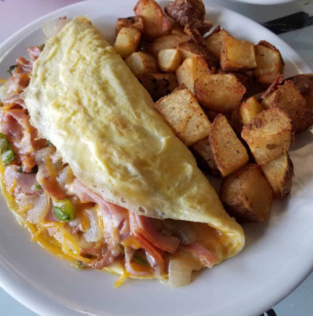 Order Meat Lovers' Omelet food online from Janik's Cafe store, Chicago on bringmethat.com