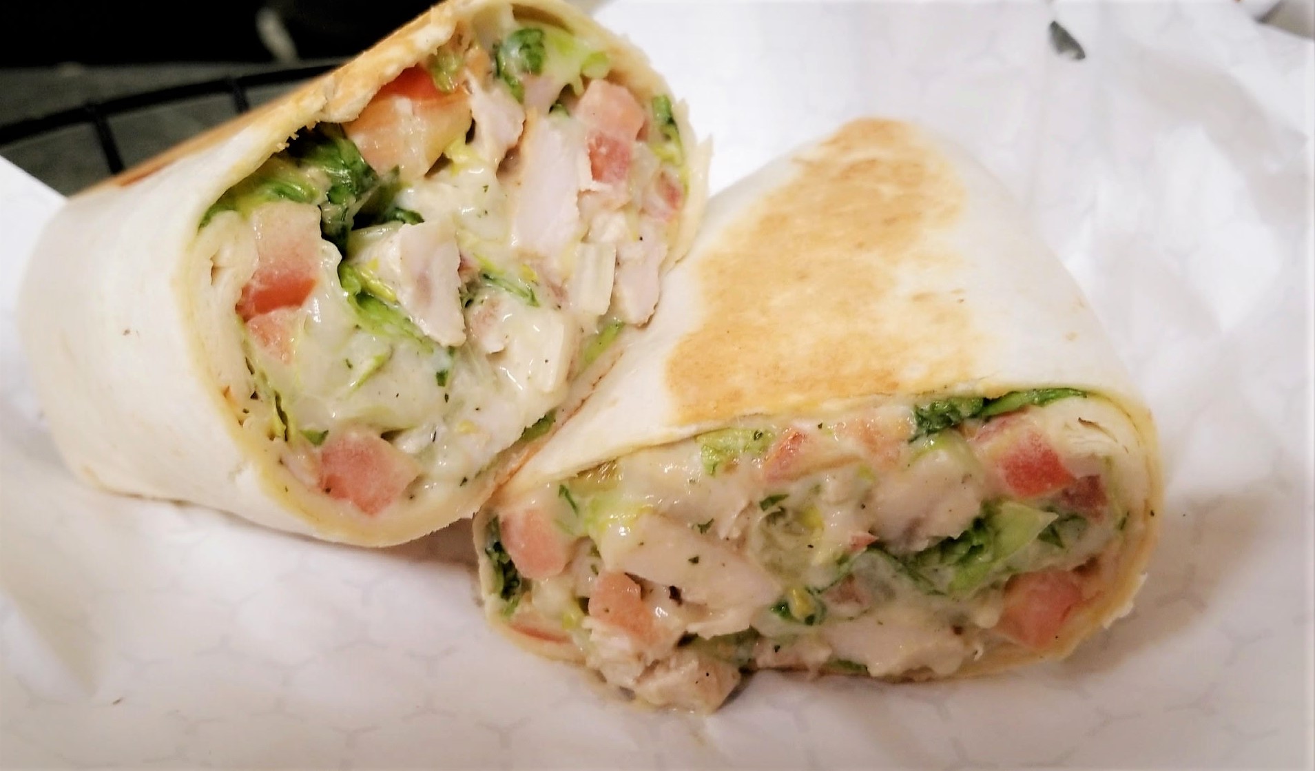 Order Pesto Chicken Wrap food online from City Tap and Grill store, Norridge on bringmethat.com