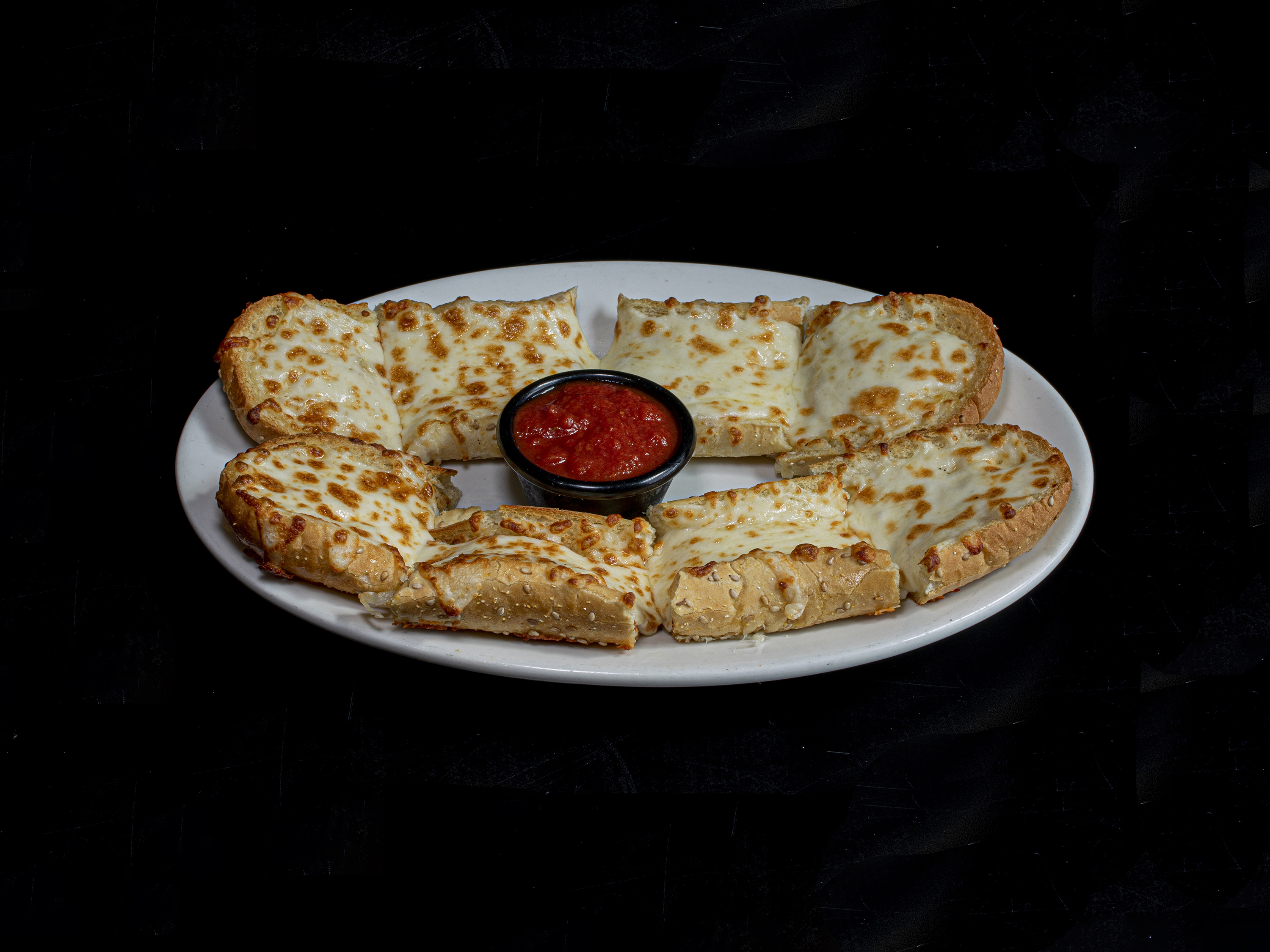 Order Cheesy Garlic Bread food online from Junior Pizza, Wings & Subs store, Dayton on bringmethat.com