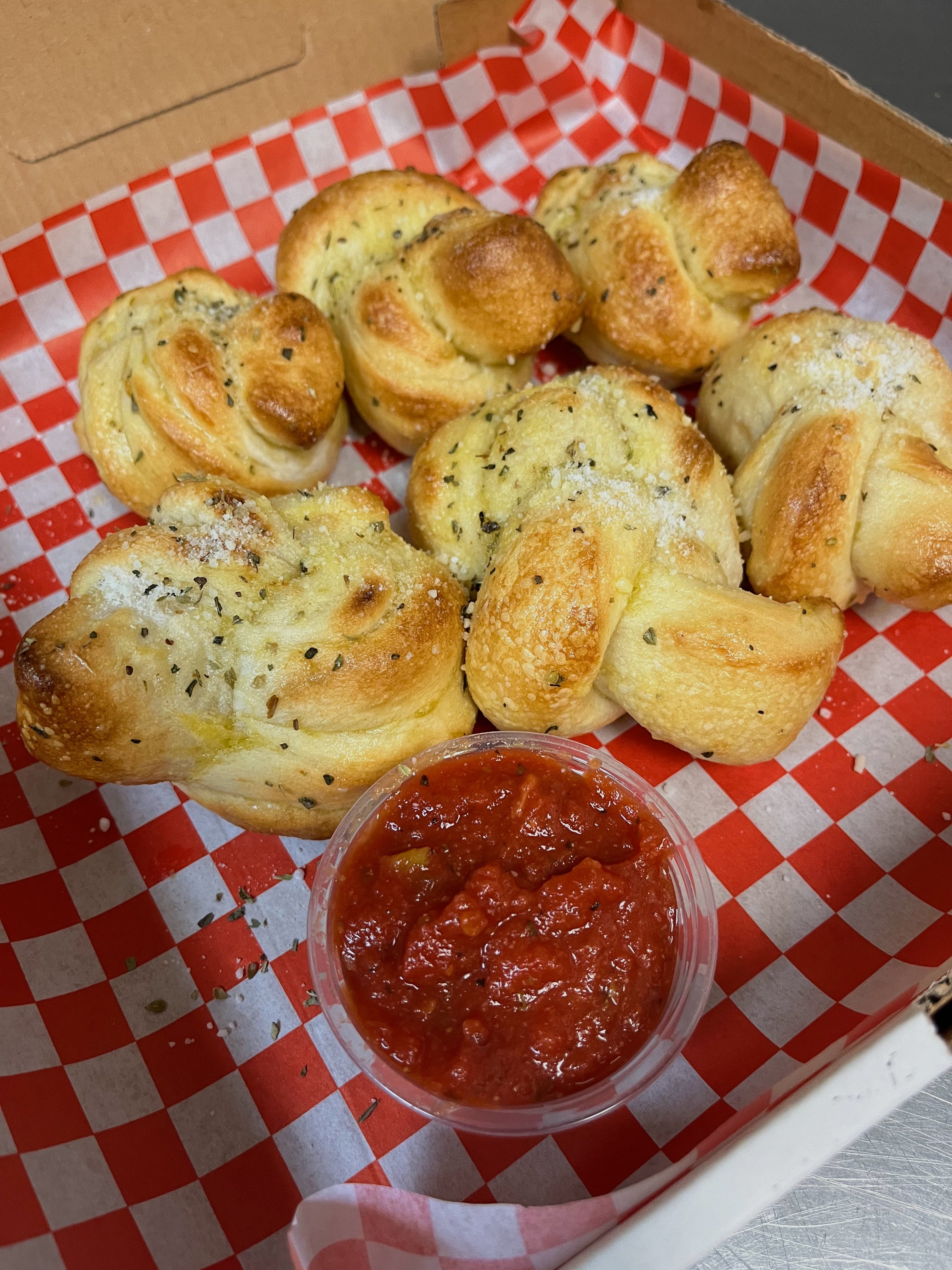 Order Giant Garlic Knots - 6 Pieces food online from Pizza Nation store, Las Vegas on bringmethat.com