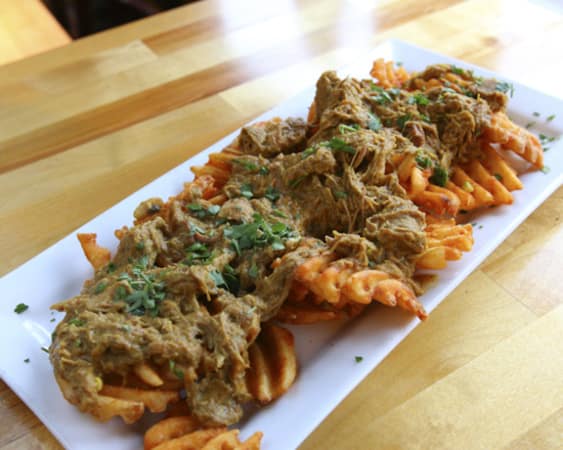Order  Chicken Curry Fries food online from Ashley's Restaurant store, Ann Arbor on bringmethat.com