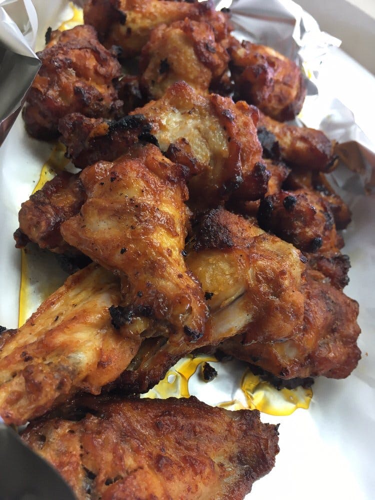 Order Award Winning Wings - 10 Pieces food online from Prima Pizza Nice Ice store, Queens Village on bringmethat.com