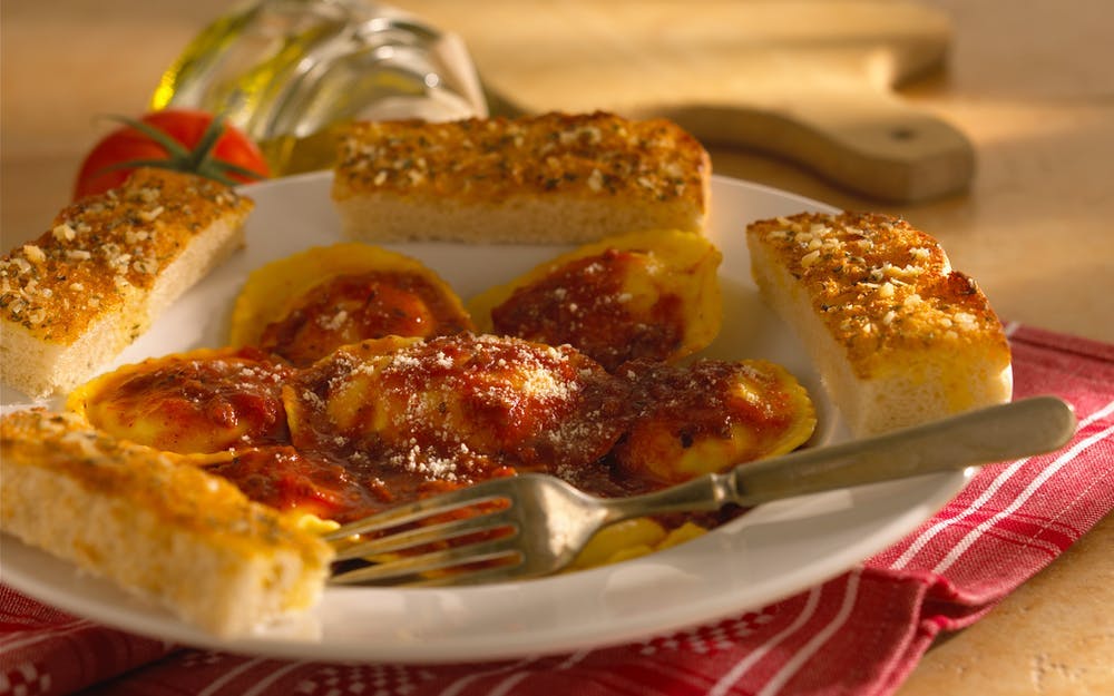 Order Ravioli & Garlic Toast - Pasta food online from Bellacino Pizza & Grinders store, Southfield on bringmethat.com