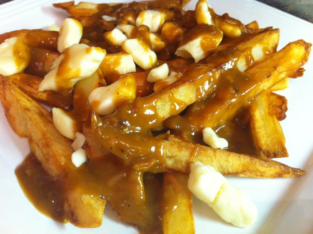 Order Poutine Fries food online from Rick Kitchen store, Yuma on bringmethat.com