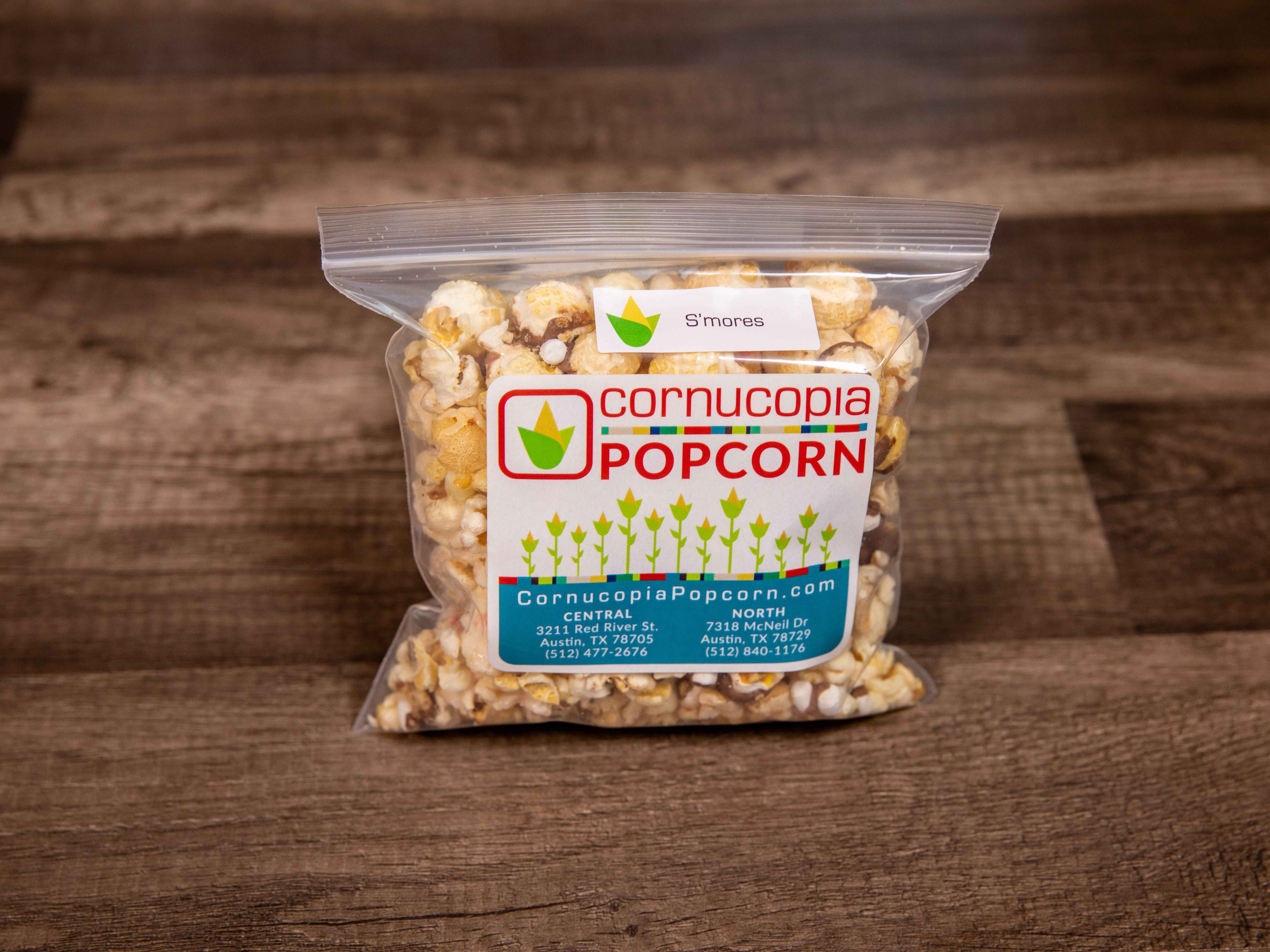 Order S'mores Popcorn food online from Cornucopia Popcorn store, Austin on bringmethat.com