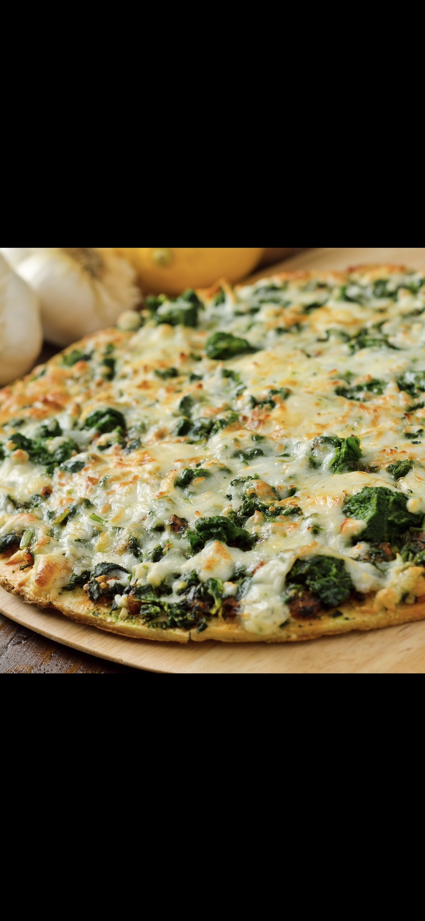 Order White Spinach Pizza food online from Rosa's Pizza store, New York on bringmethat.com