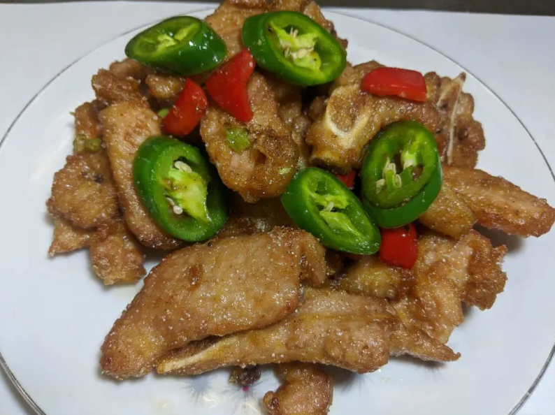 Order Salt & Pepper Pork Chop-黑椒猪扒 food online from New China Station store, Chicago on bringmethat.com