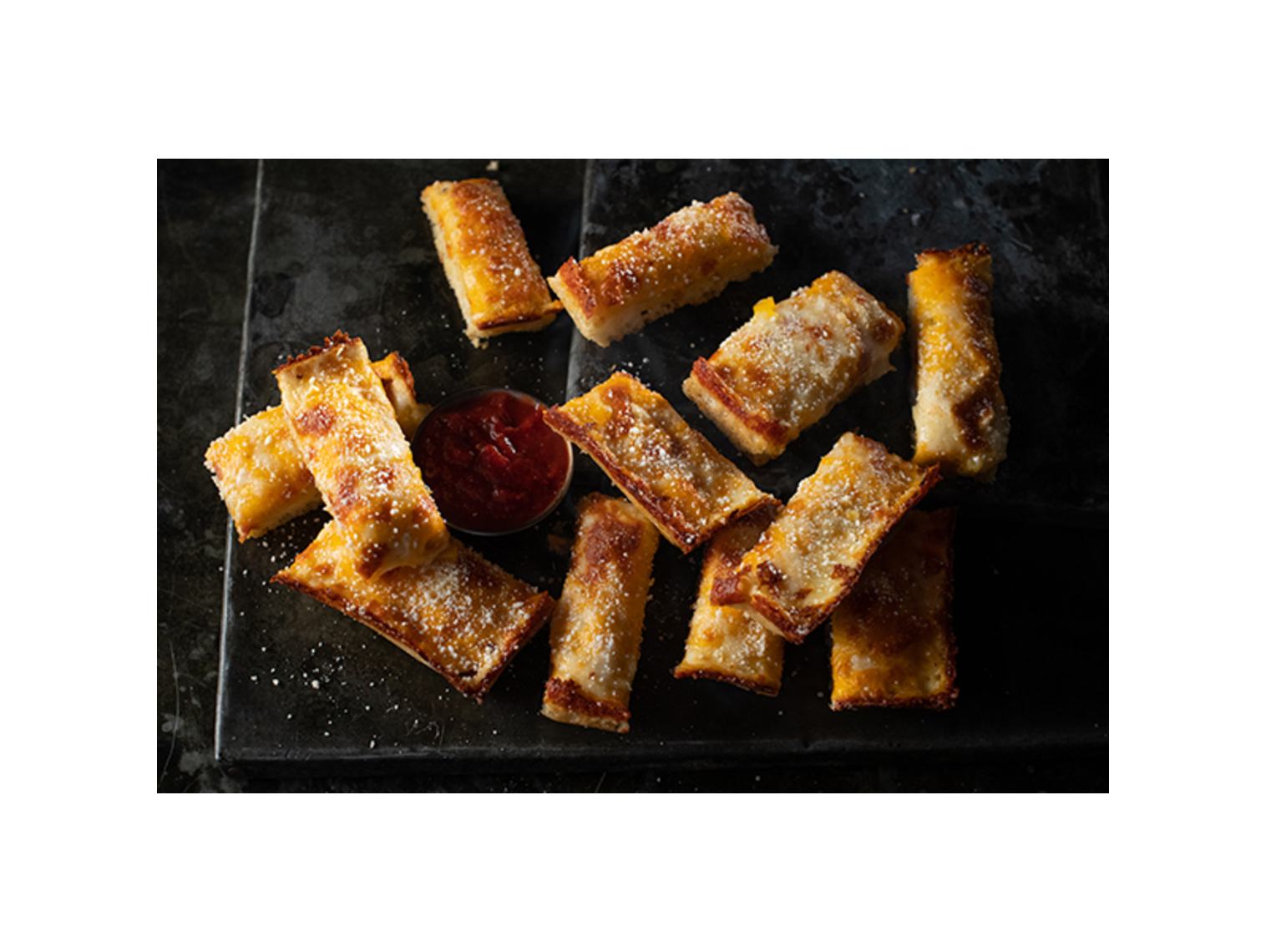 Order Jet's Triple Cheese Turbo Stix food online from Jet's Pizza store, Monroe on bringmethat.com