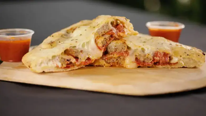Order Pepperoni and Sausage Calzone food online from Zeppe'S Pizzeria store, Middlefield on bringmethat.com