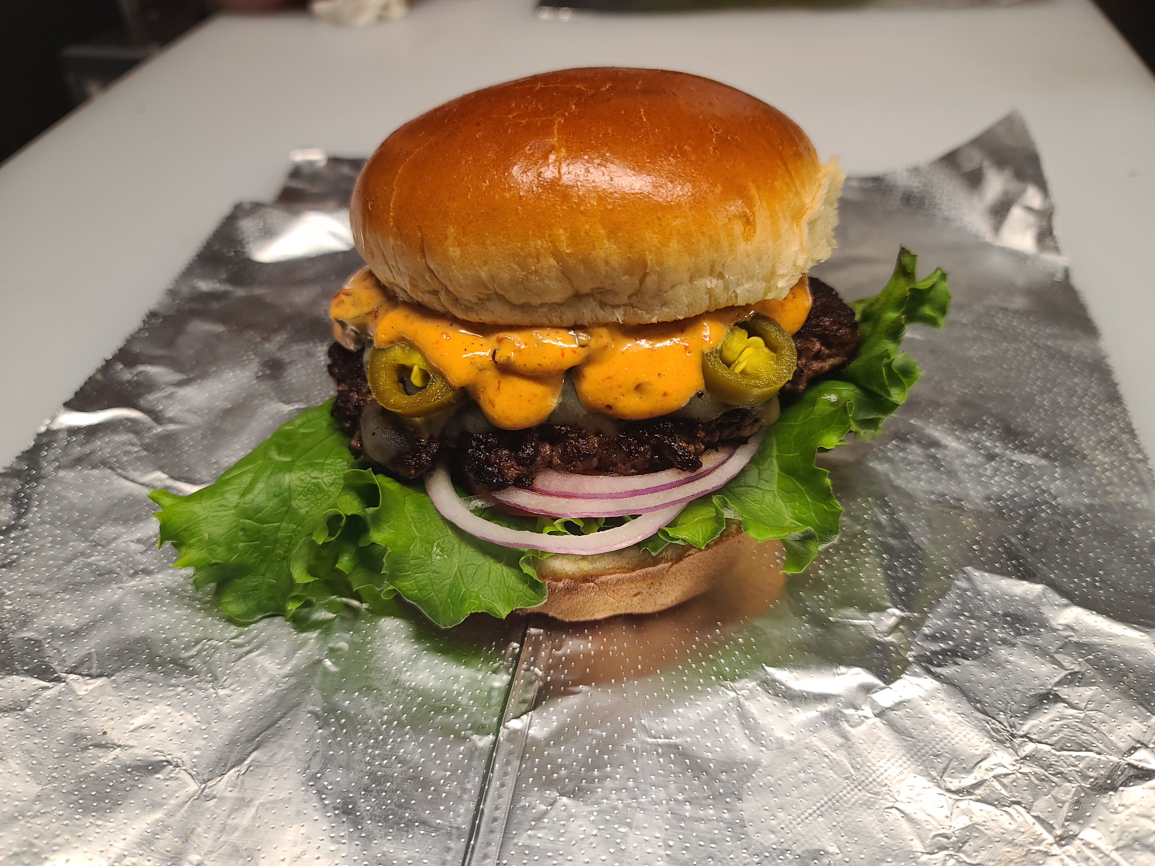 Order Burn Card Burger (Fire Burger) food online from Real Deal Grill store, Delaware on bringmethat.com