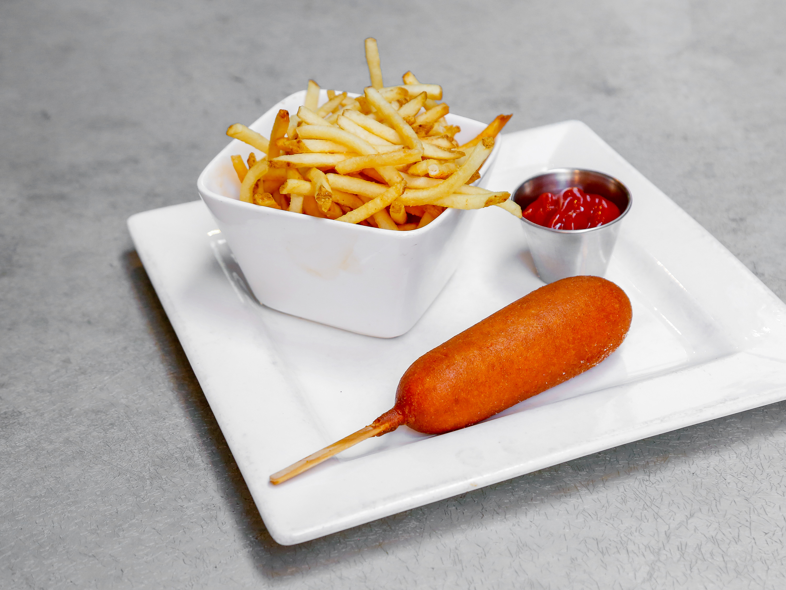 Order Kids Corn Dog and Fries food online from Bistro 7 store, Reno on bringmethat.com