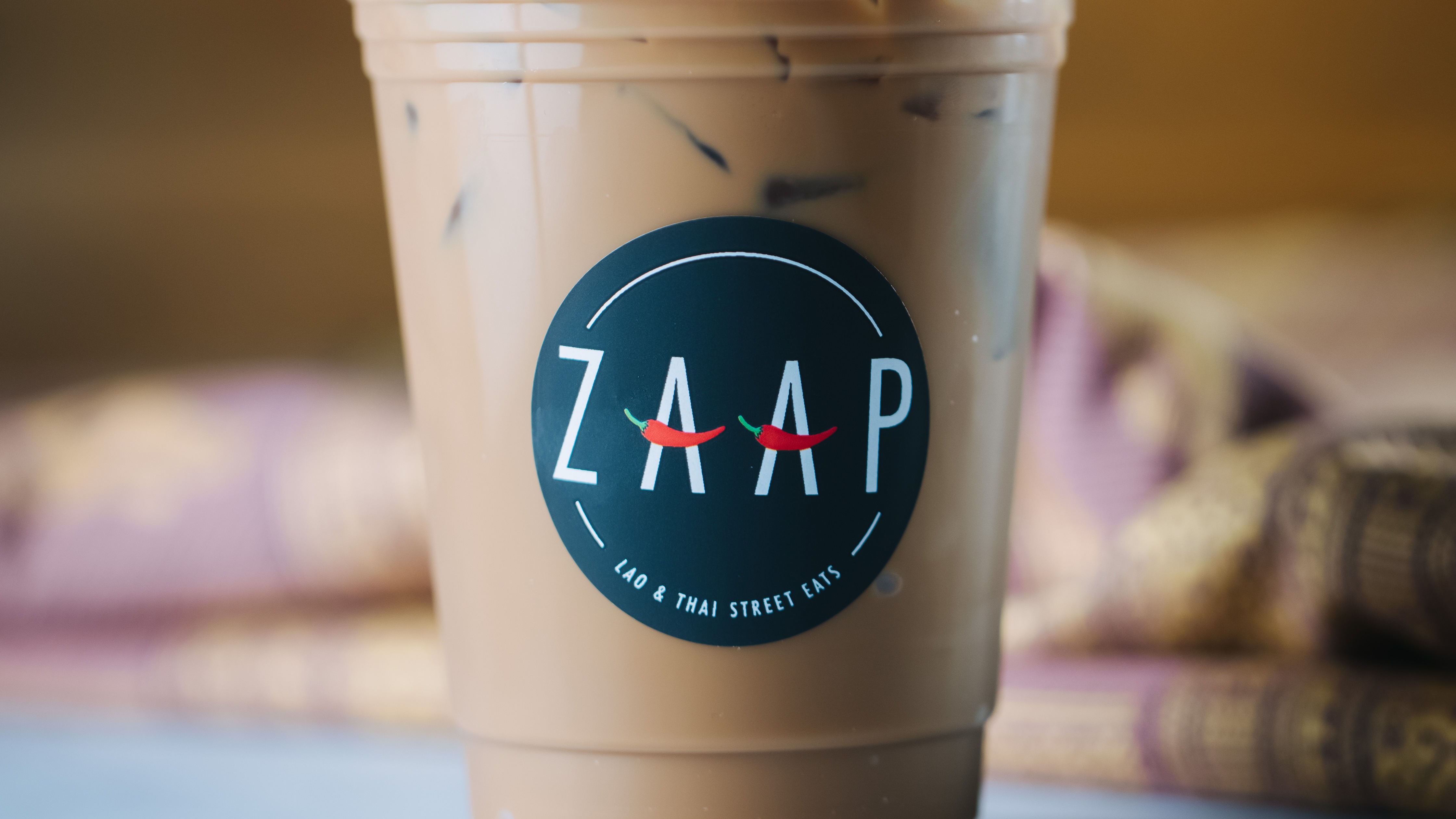 Order Lao Iced Coffee food online from Zaap Kitchen Of Casa Linda store, Dallas on bringmethat.com