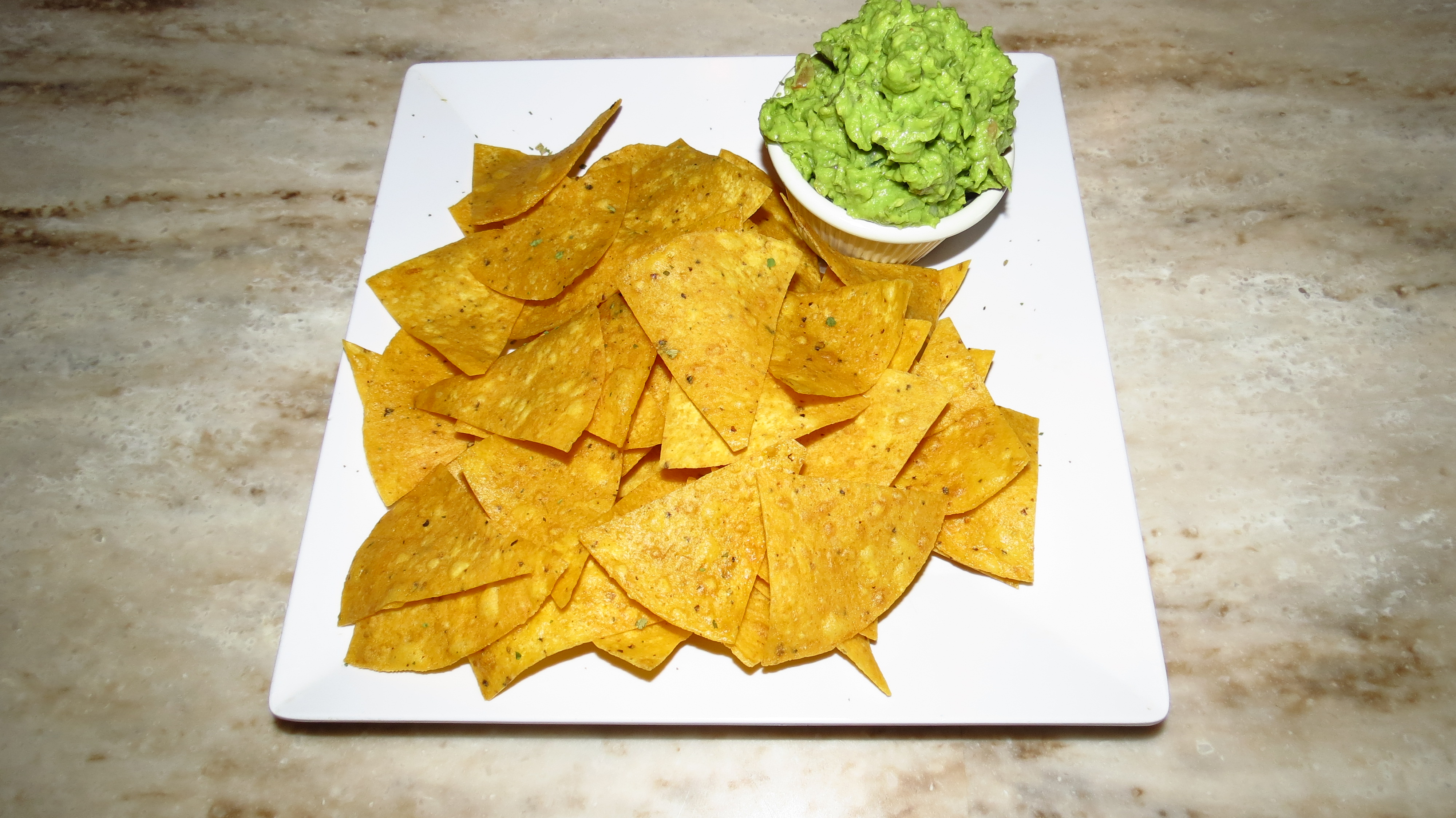 Order Tortilla Chips with Guacamole food online from Tropix Bar & Lounge store, Rego Park on bringmethat.com