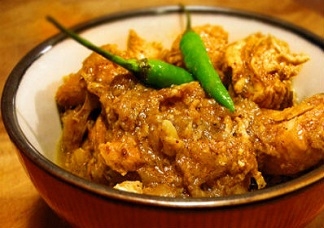 Order Vindaloo  (Choice of meat) food online from Hyderabad House Biryani Place store, Omaha on bringmethat.com